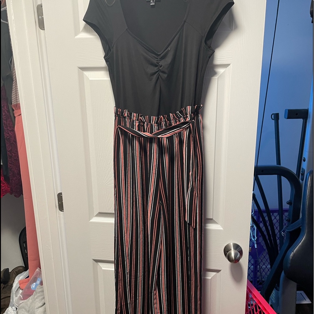 Never worn Womens jumpsuit romper size L
